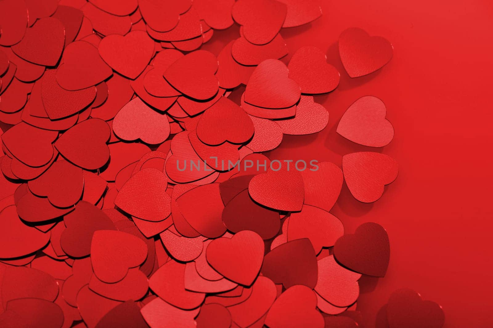 Detailed view of many small red glitter hearts