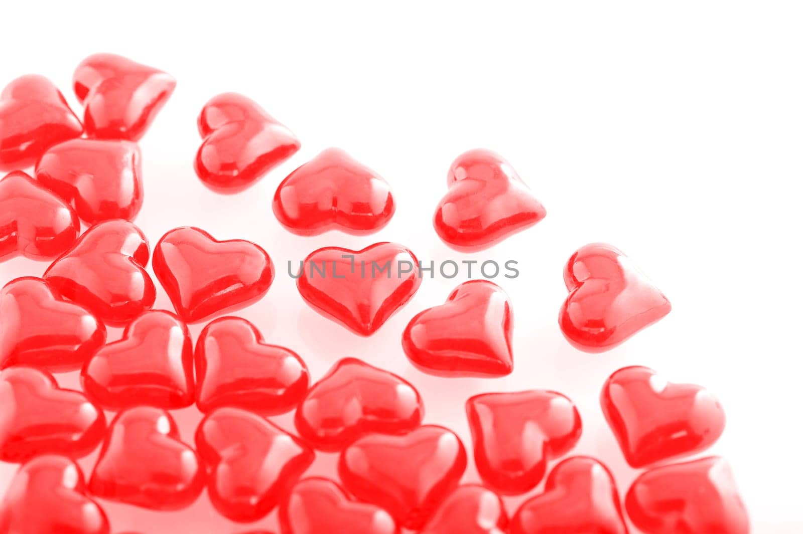 Red glass hearts on a white background