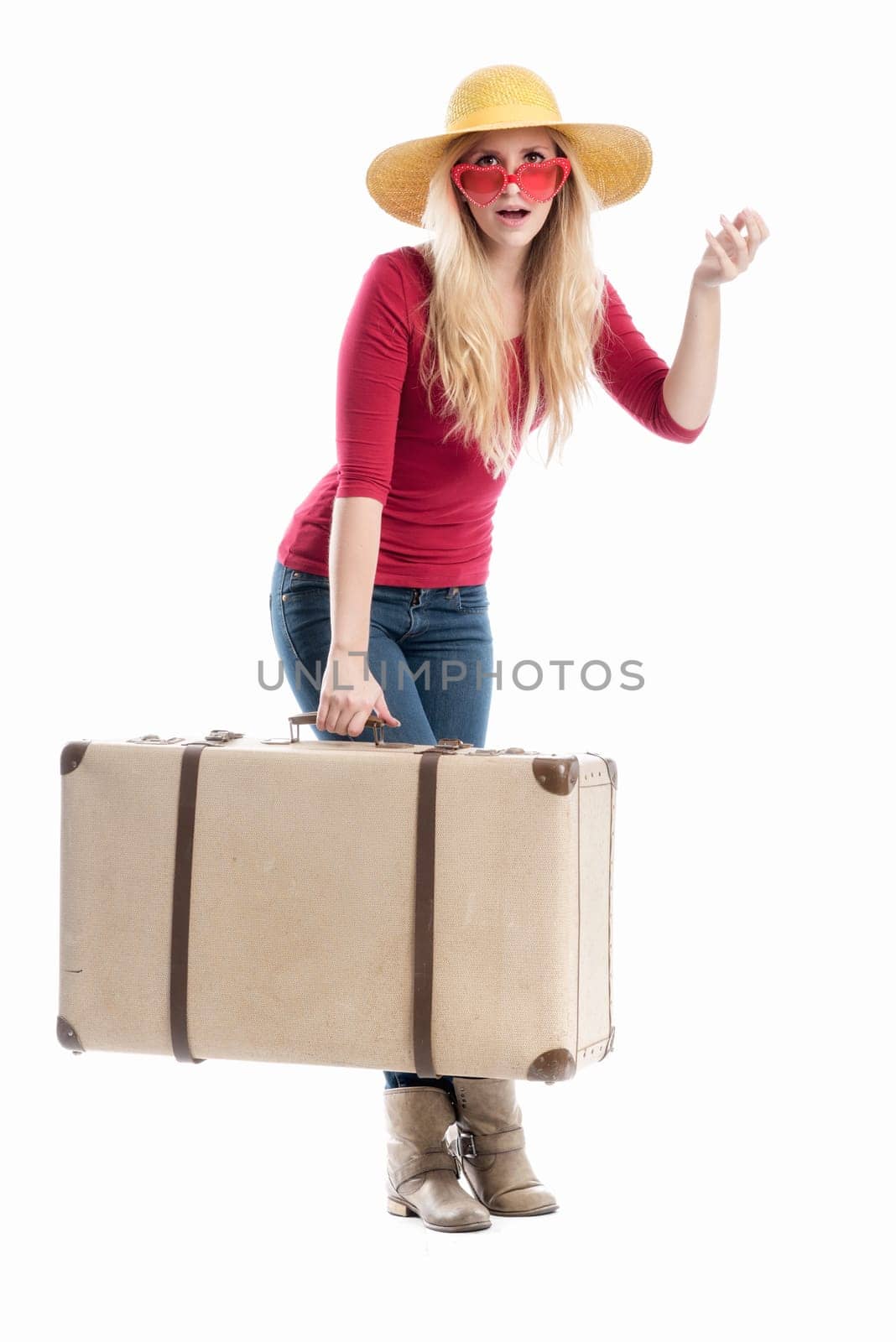 a confused woman with a suitcase