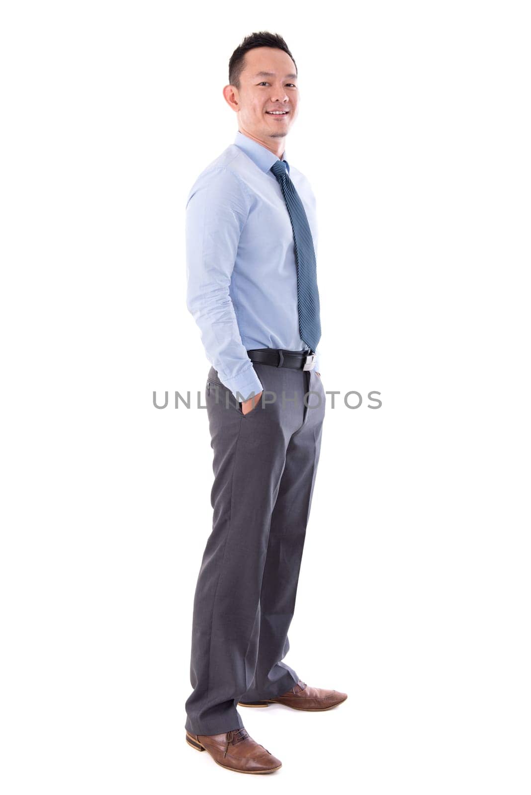 Asian business man smiling, full length standing isolated over white background.