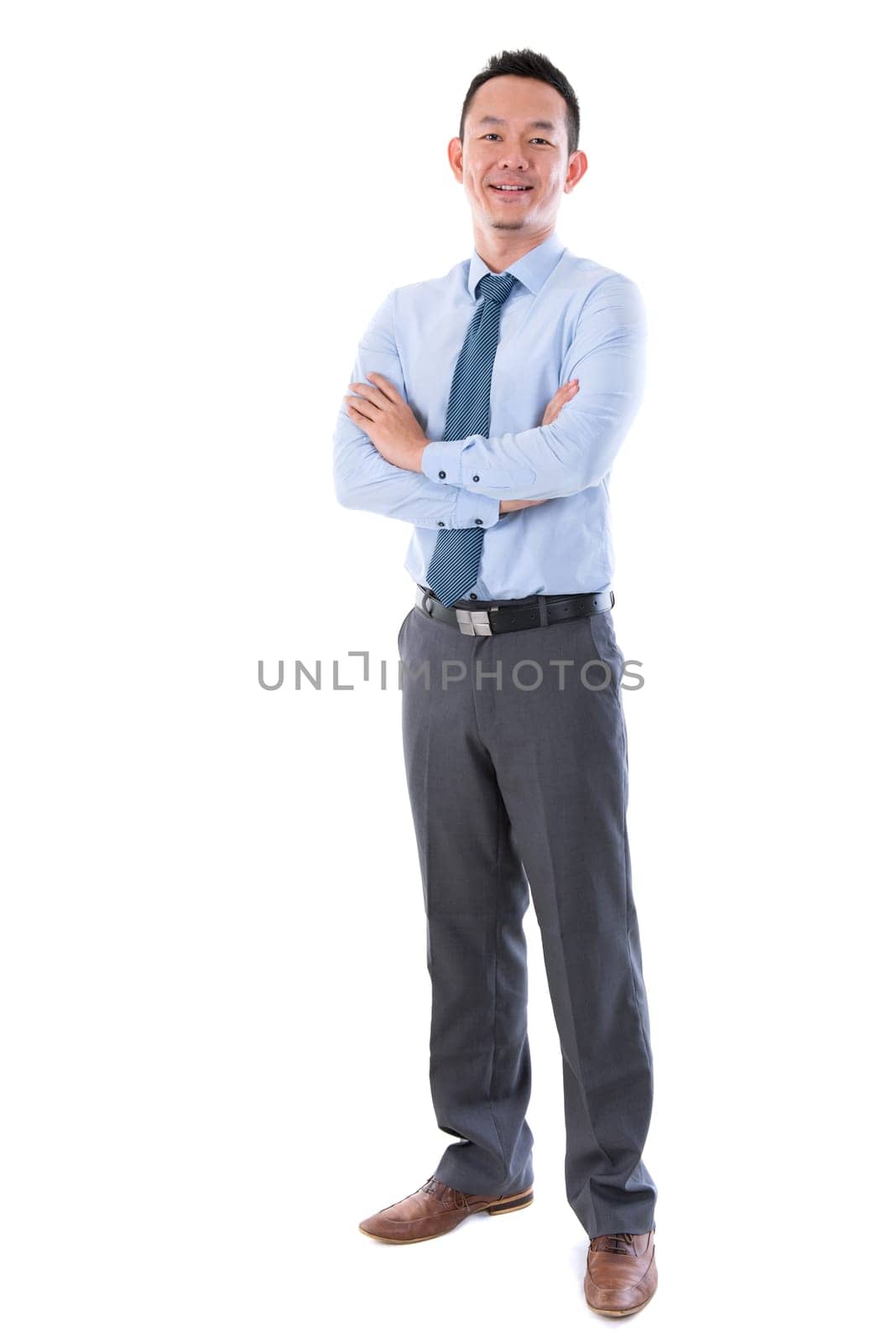 Middle aged Asian business man smiling, full length standing isolated over white background.