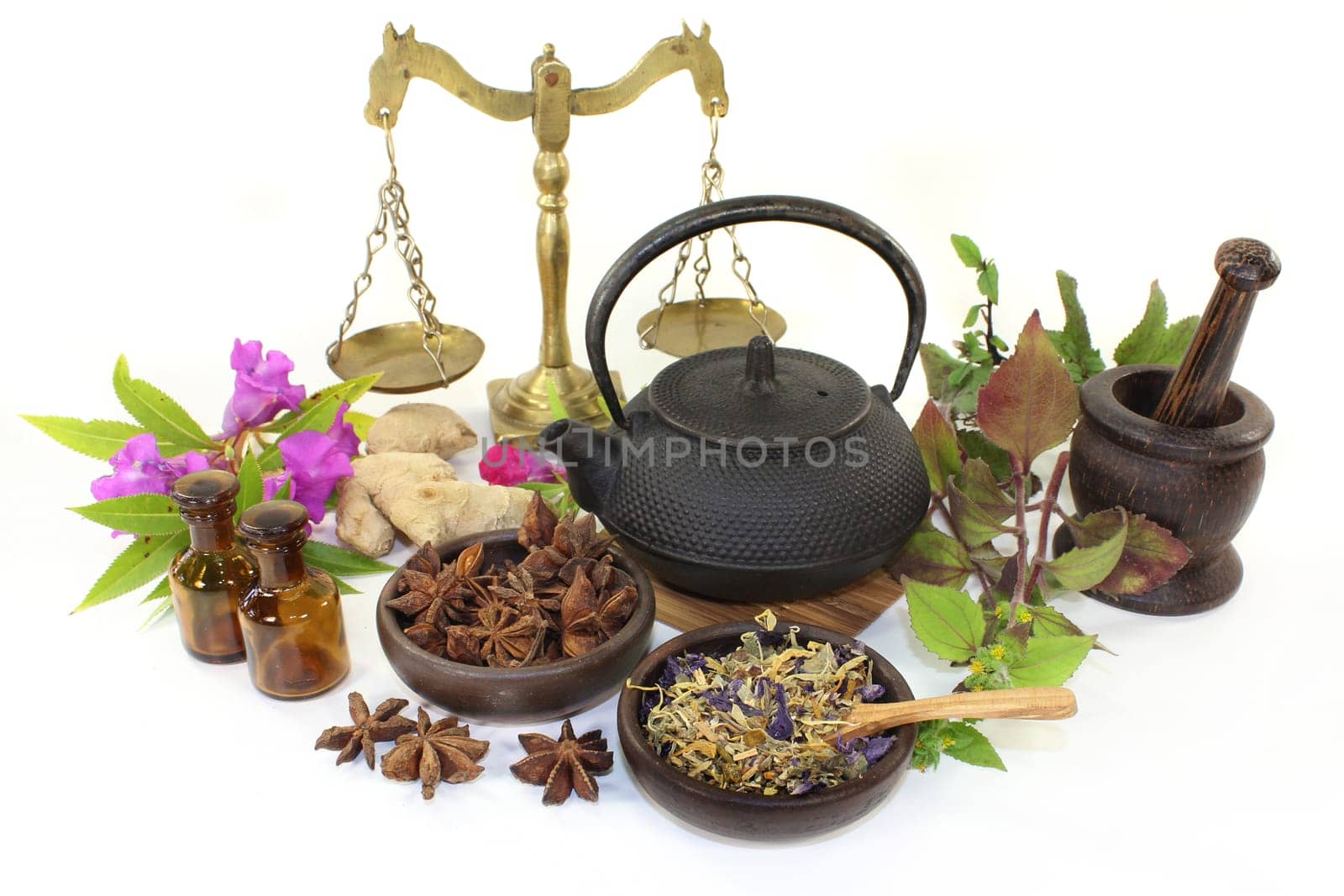 a cup of herbal tea and Chinese herbs