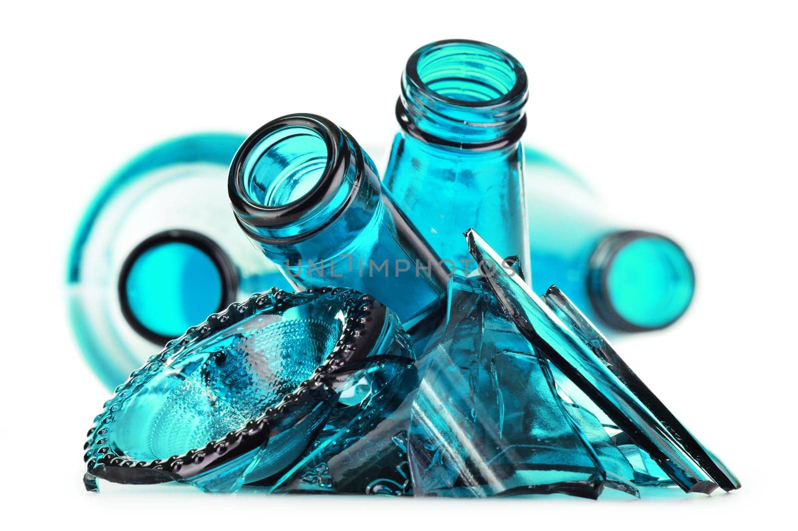 Pieces of broken glass over white background. Recycling.