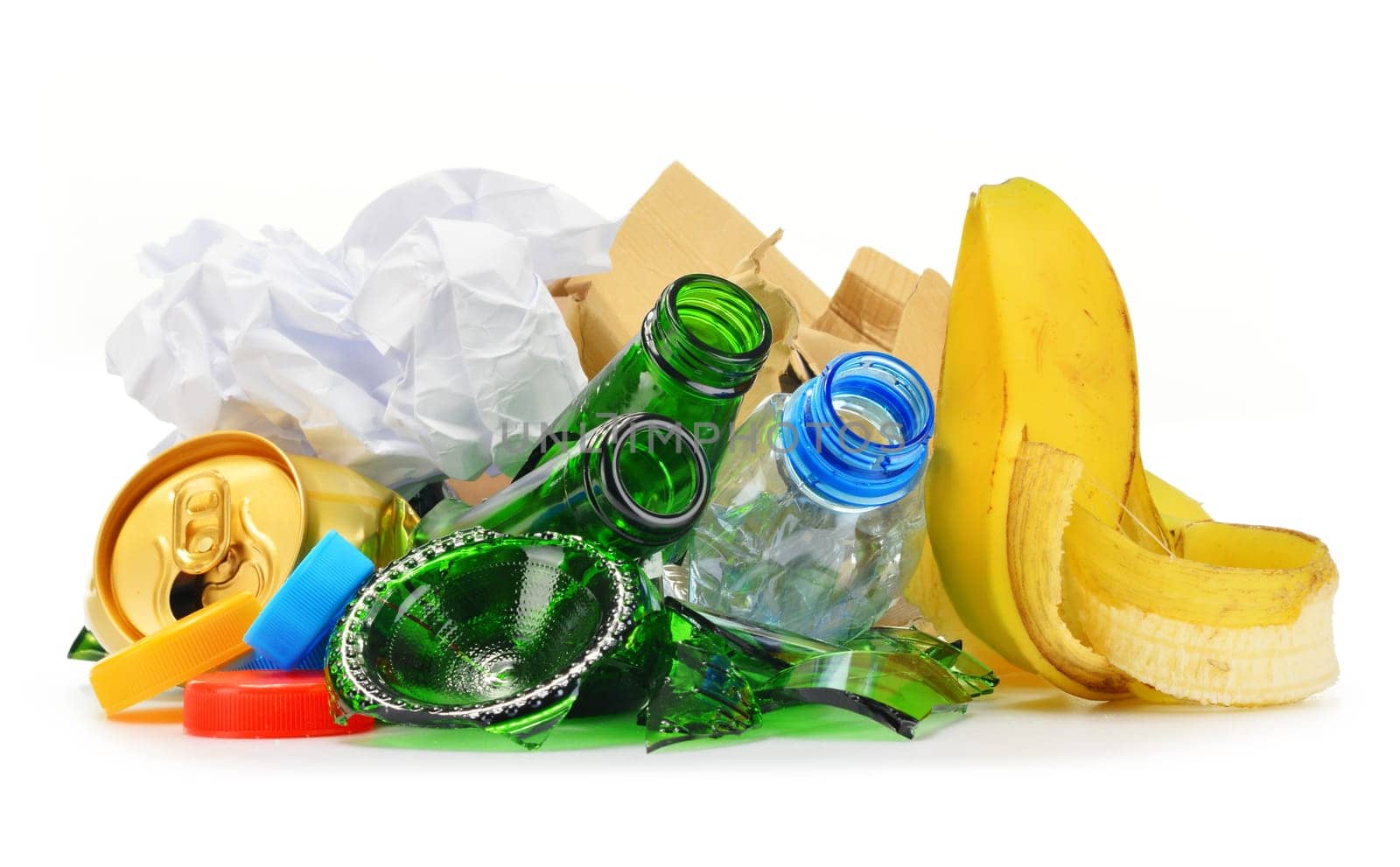 Composition with recyclable garbage consisting of glass, plastic, metal and paper isolated on white background