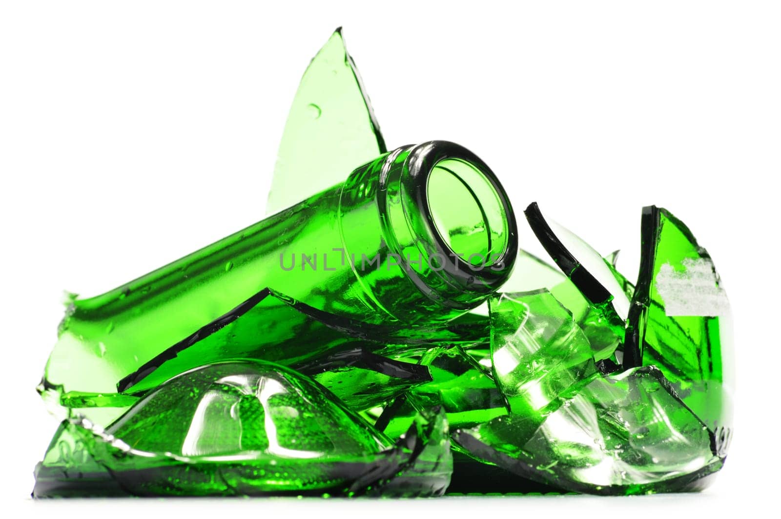 Pieces of broken glass over white background. Recycling.