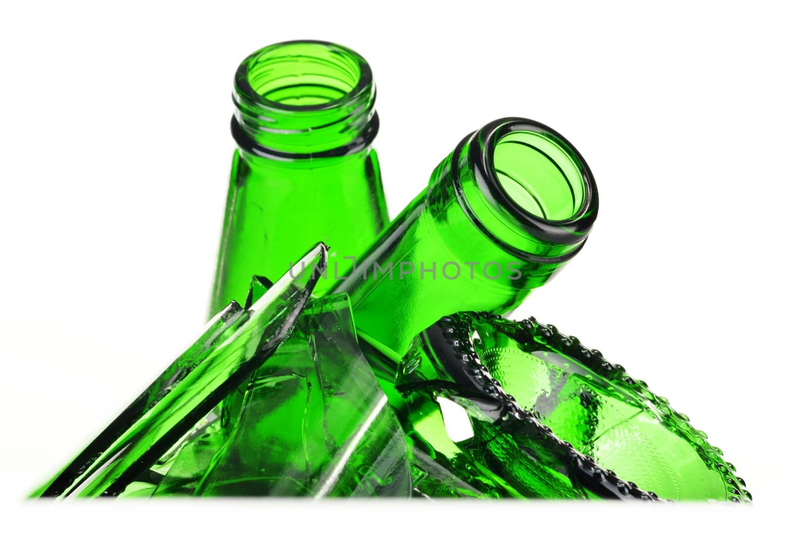 Pieces of broken glass over white background. Recycling.