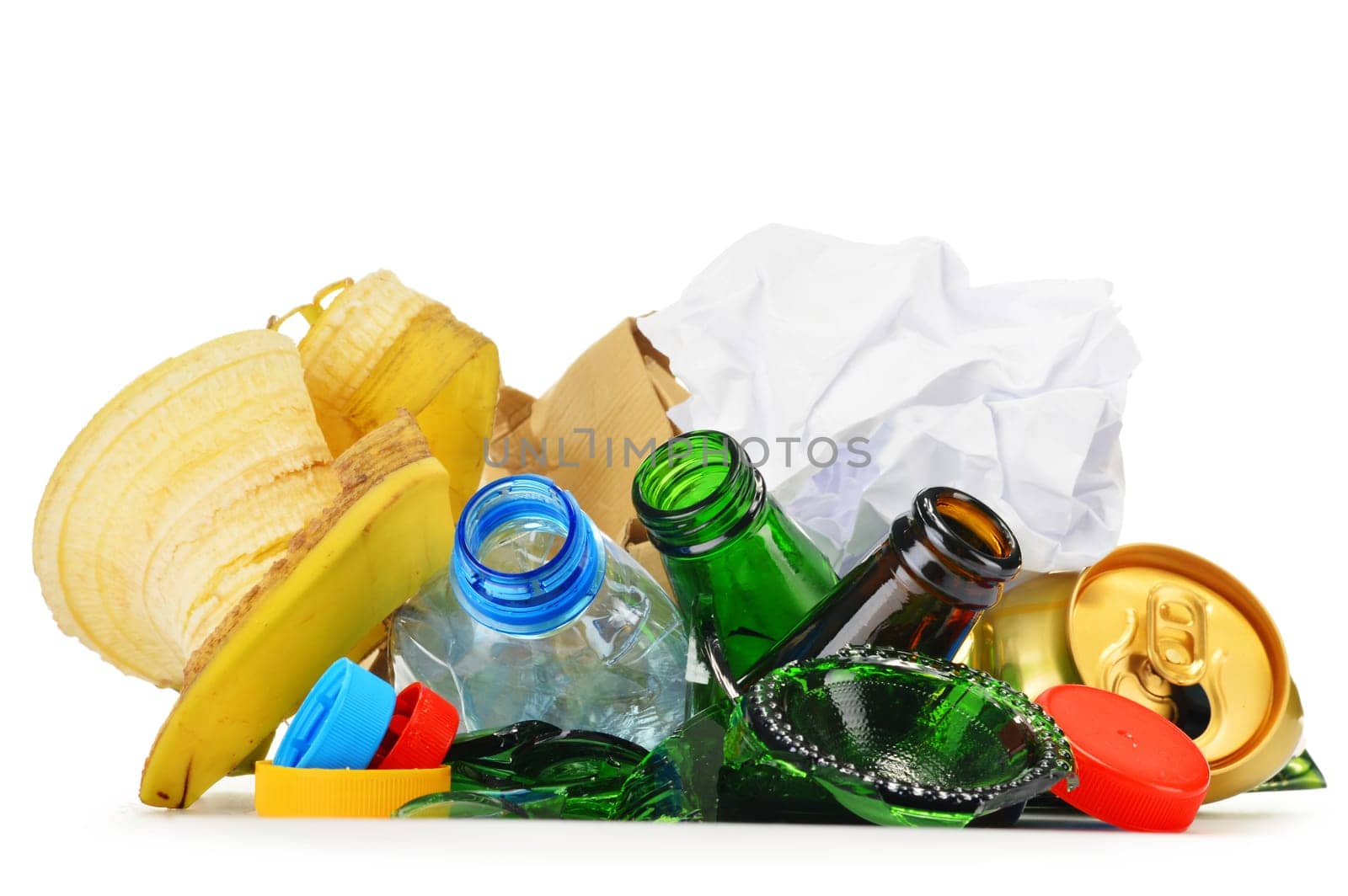 Composition with recyclable garbage consisting of glass, plastic, metal and paper isolated on white background