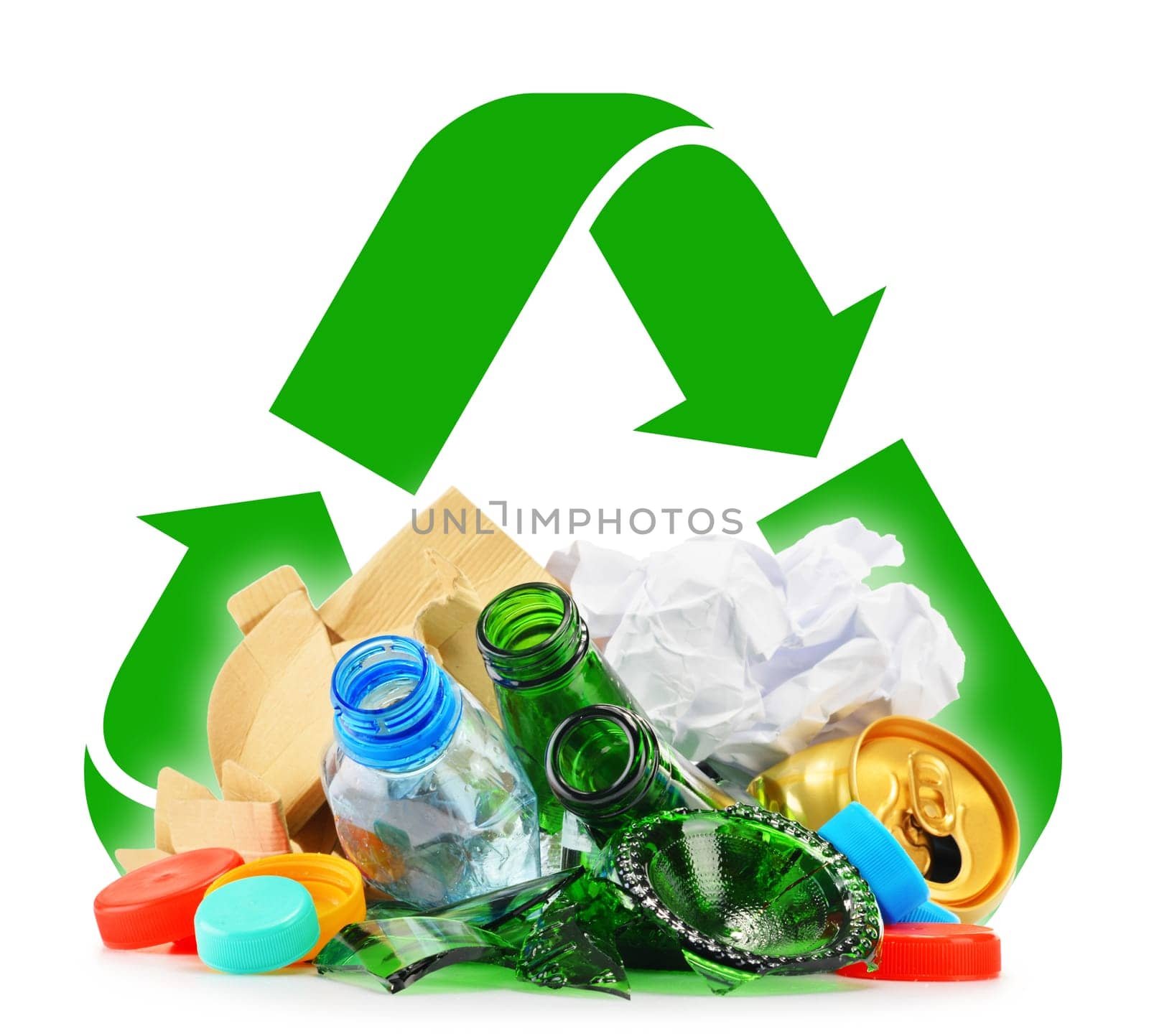 Composition with recyclable garbage consisting of glass, plastic, metal and paper isolated on white background