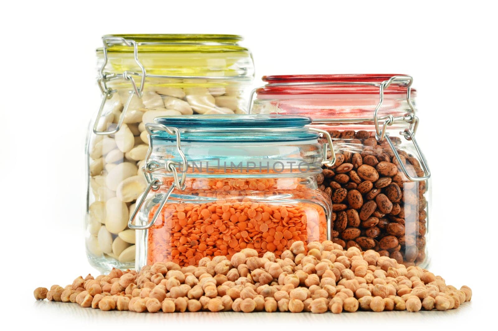 Jars with grain foods isolated on white background