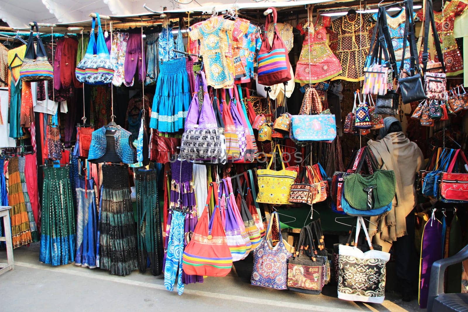 Window display of apparels and bags in a street