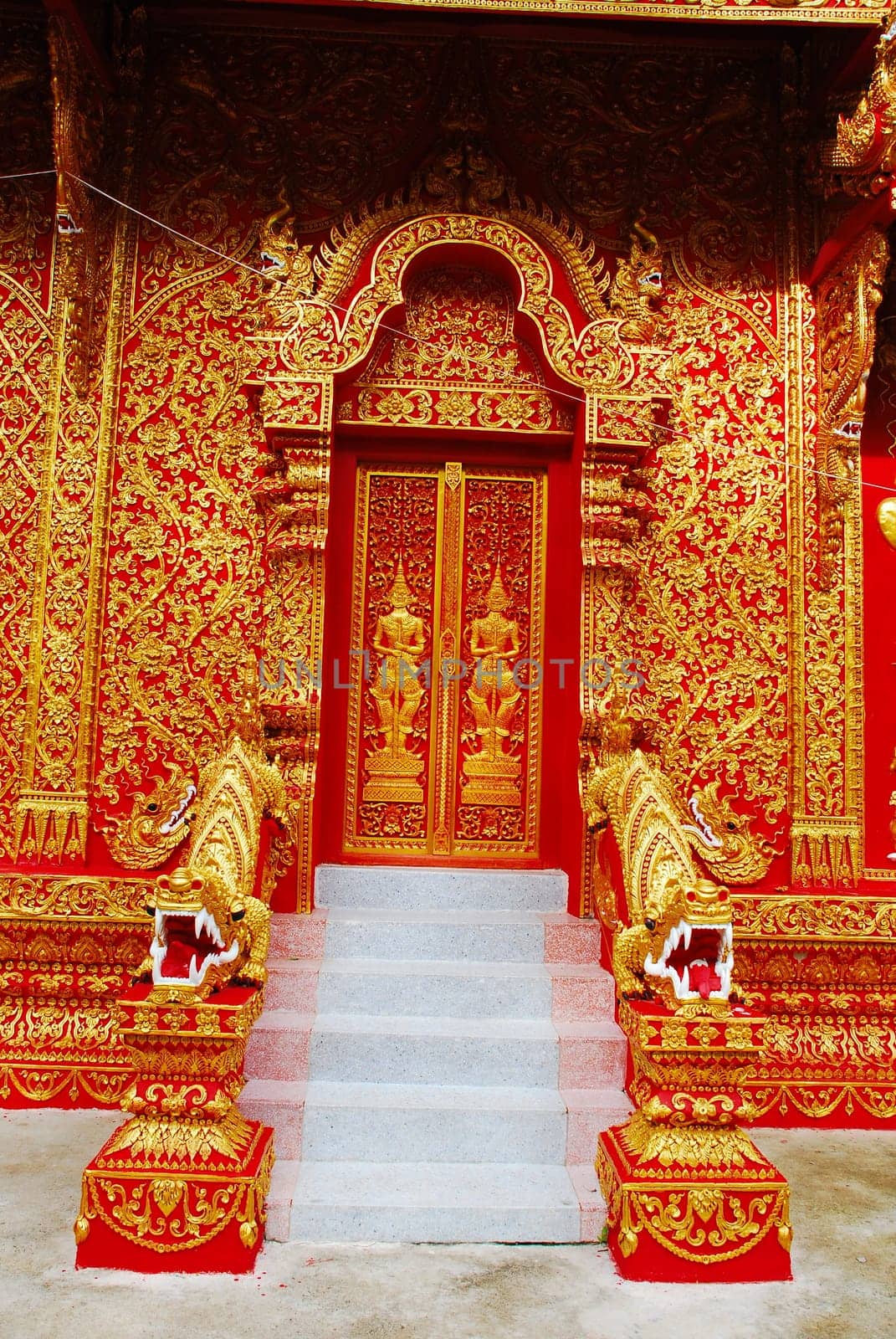 horse carriage and  temple Phrathat Lampang Luang in Lampang, Thailand