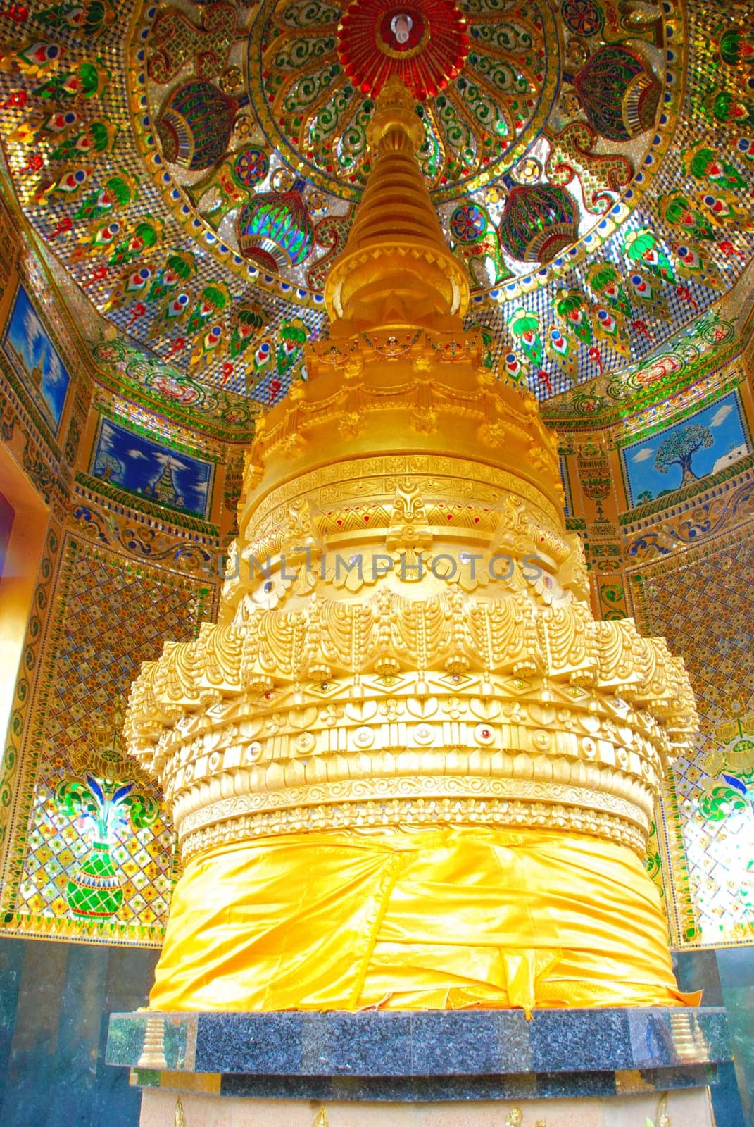 horse carriage and  temple Phrathat Lampang Luang in Lampang, Thailand