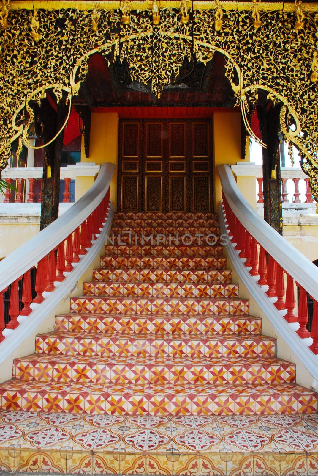 horse carriage and  temple Phrathat Lampang Luang in Lampang, Thailand
