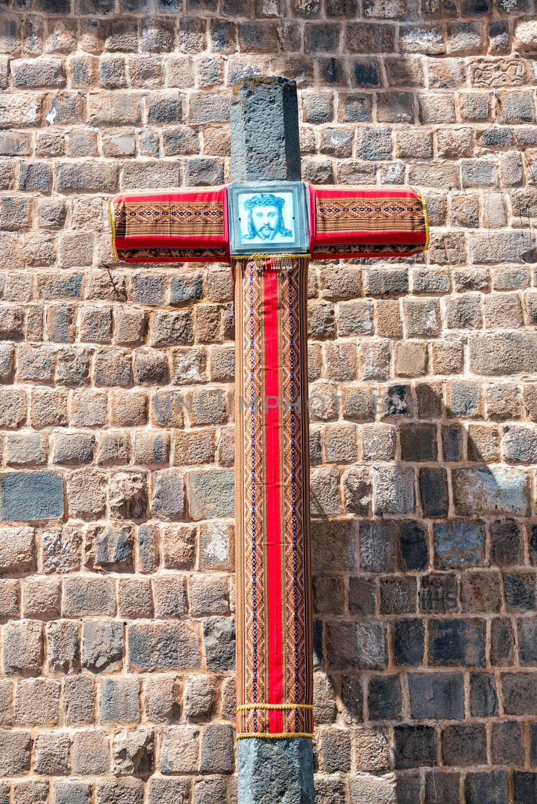 Cross with a picture of Jesus on it in the San Blas neighborhood in Cusco, Peru