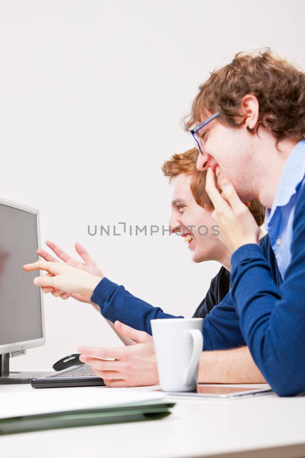 copyspace ready screen and two workers smiling at it