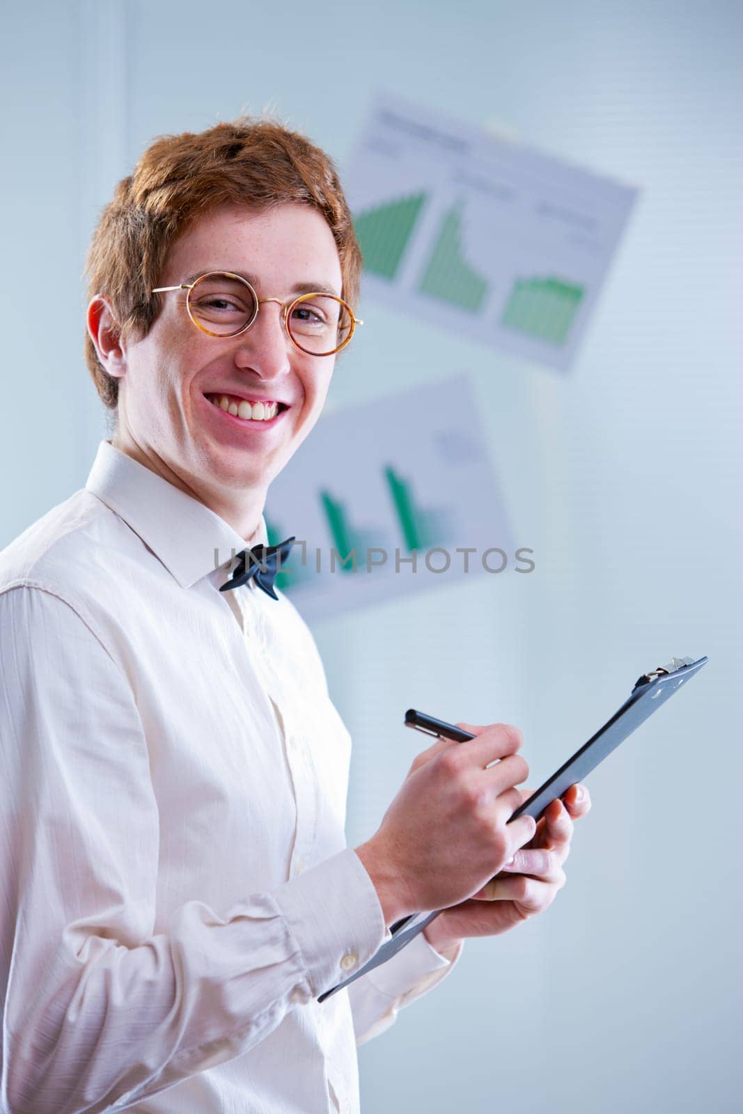 a redheaded accountant with glasses sayin that accounting means funny numbers always squaring