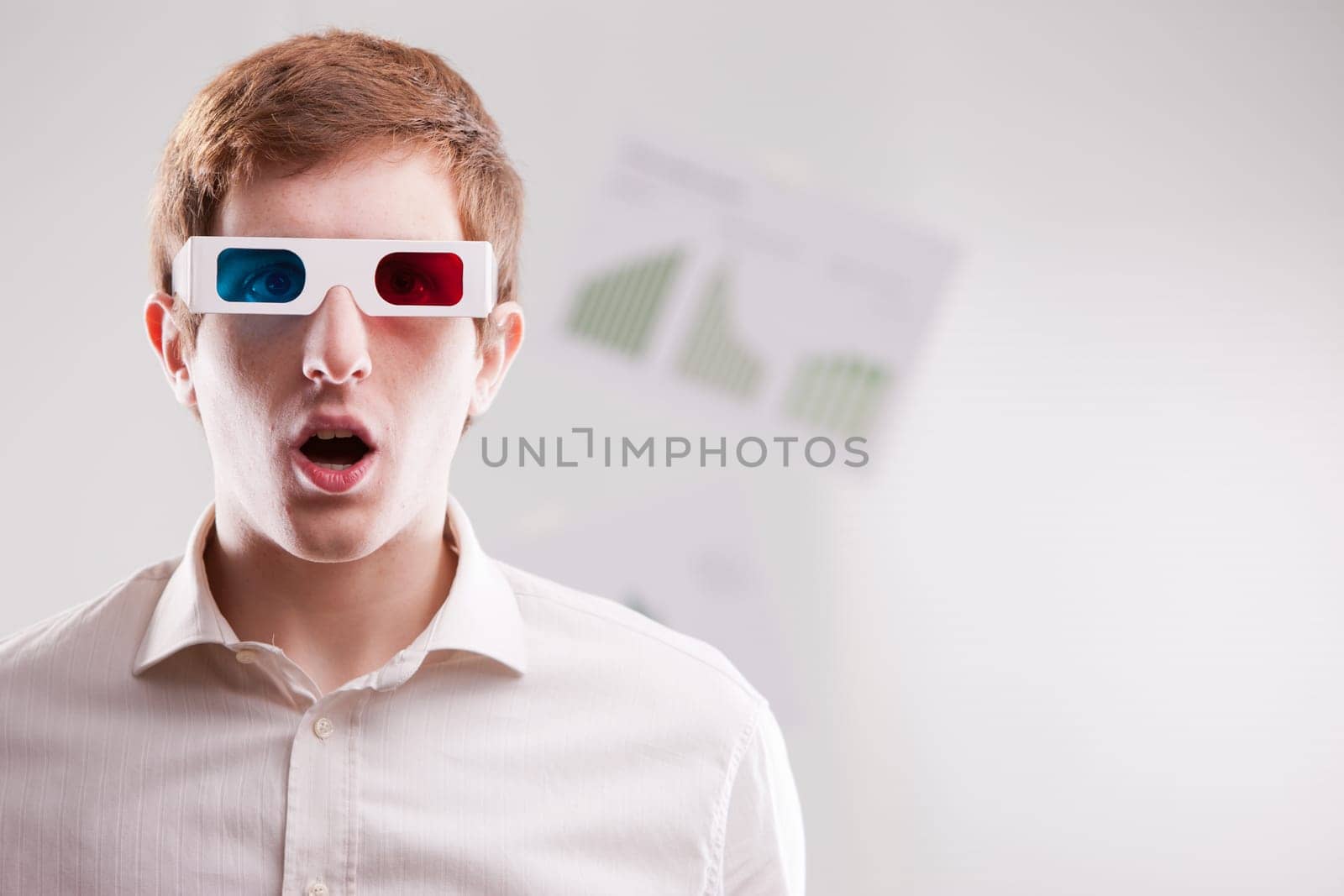 dazzled man with 3d glasses and open mouth