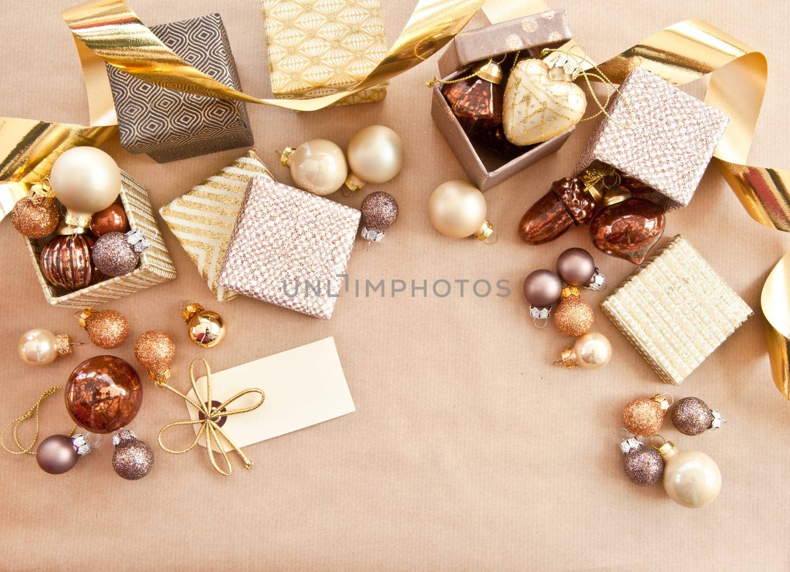 Colorful Christmas tree balls in small gift boxes with pattern
