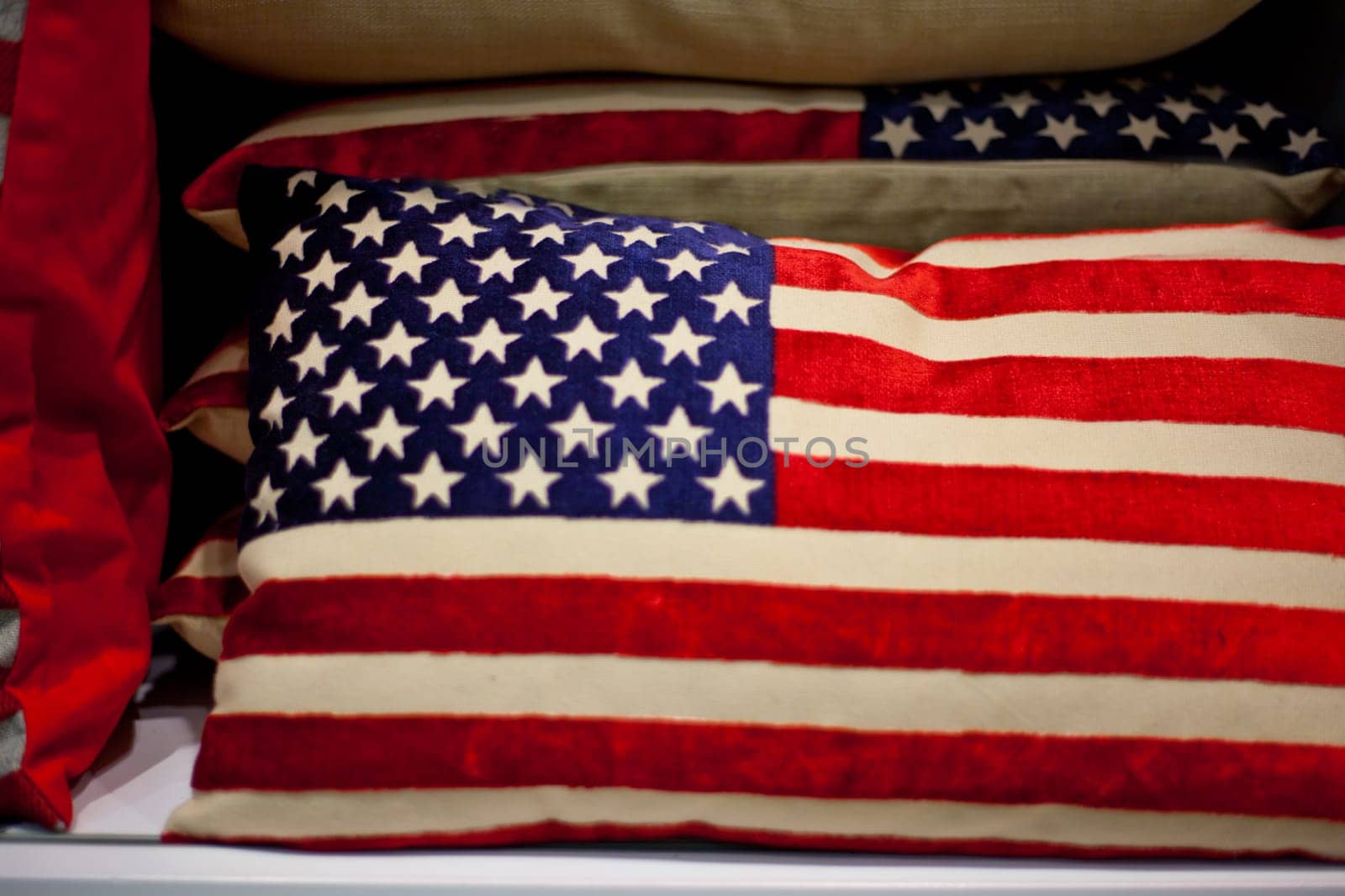 American flag cushion on sale. Selective focus