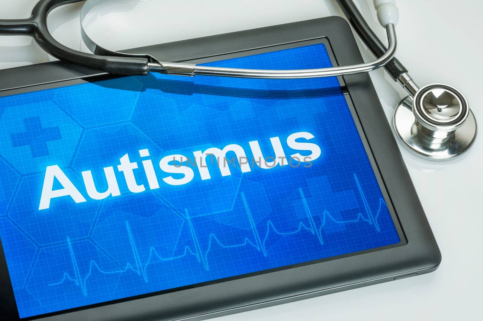 Tablet with the diagnosis autism on display
