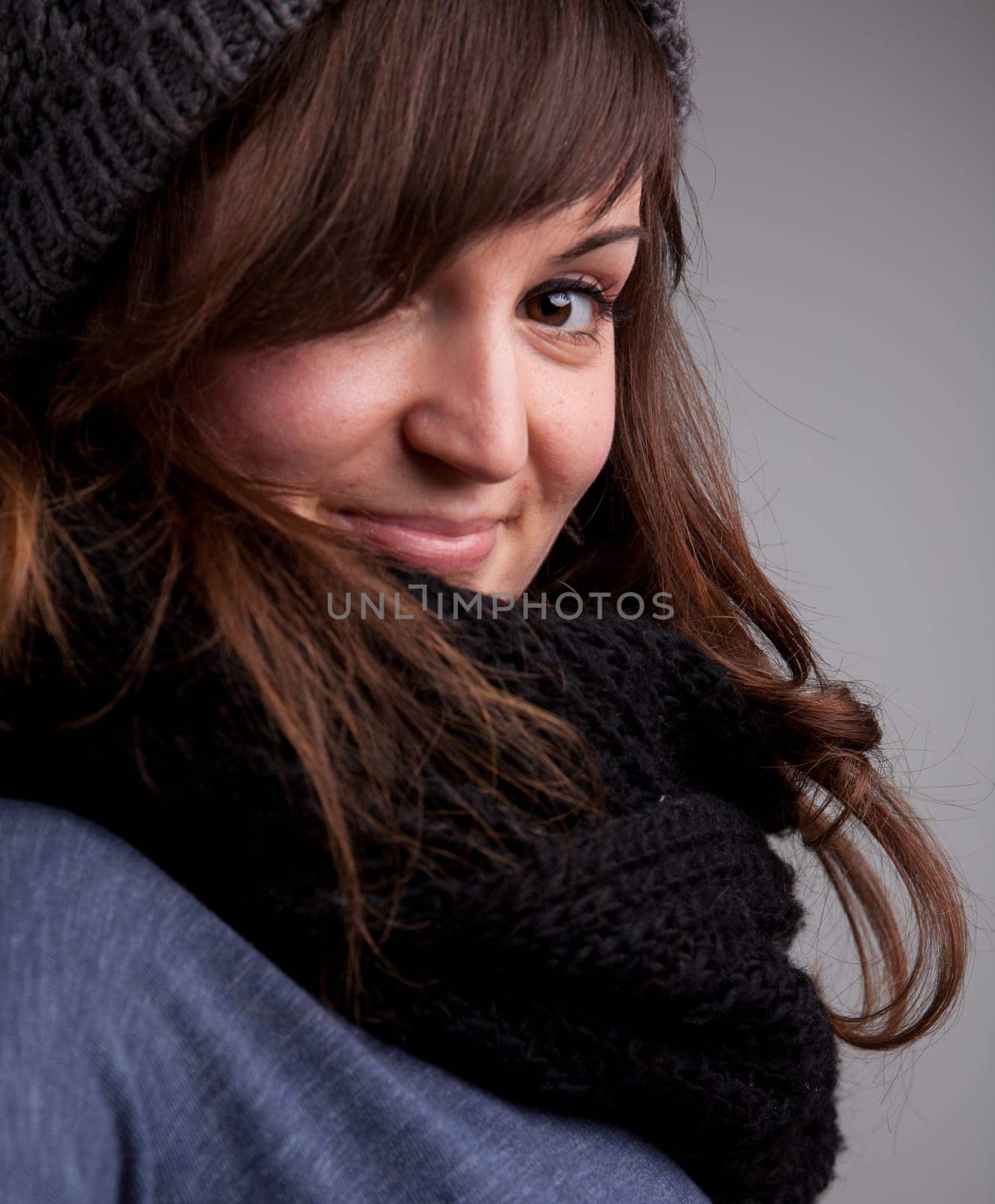 A pretty natural smiling girl in winter clothes