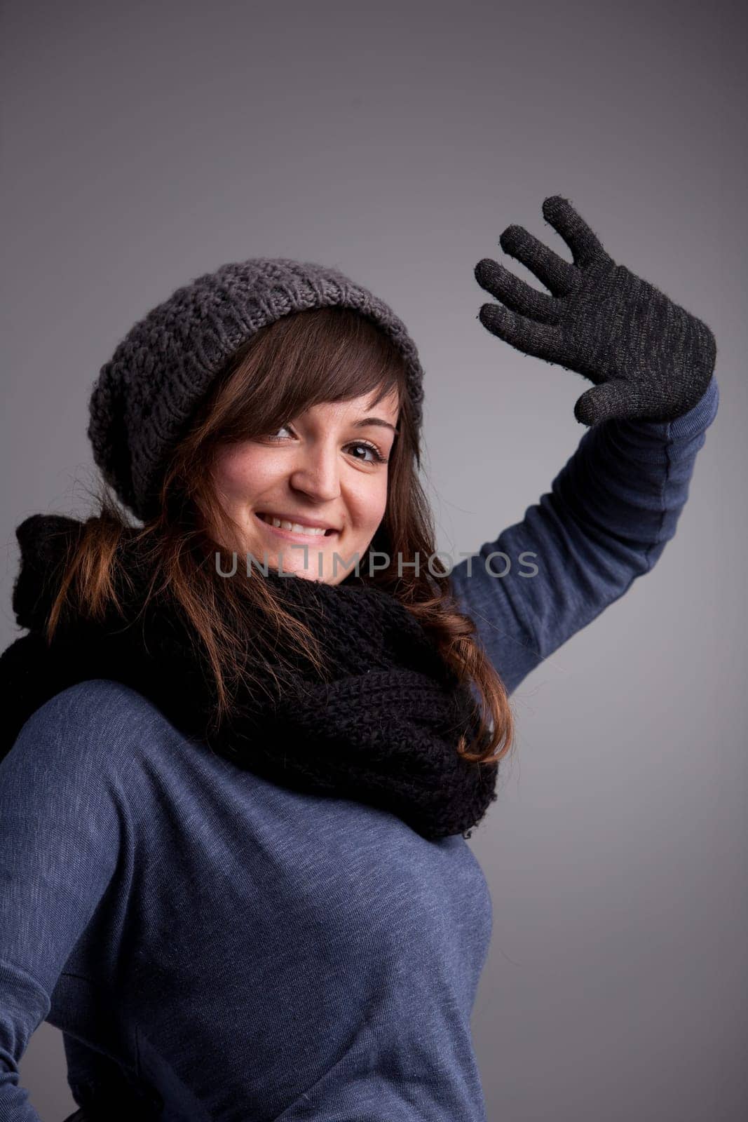 A pretty natural smiling girl in winter clothes