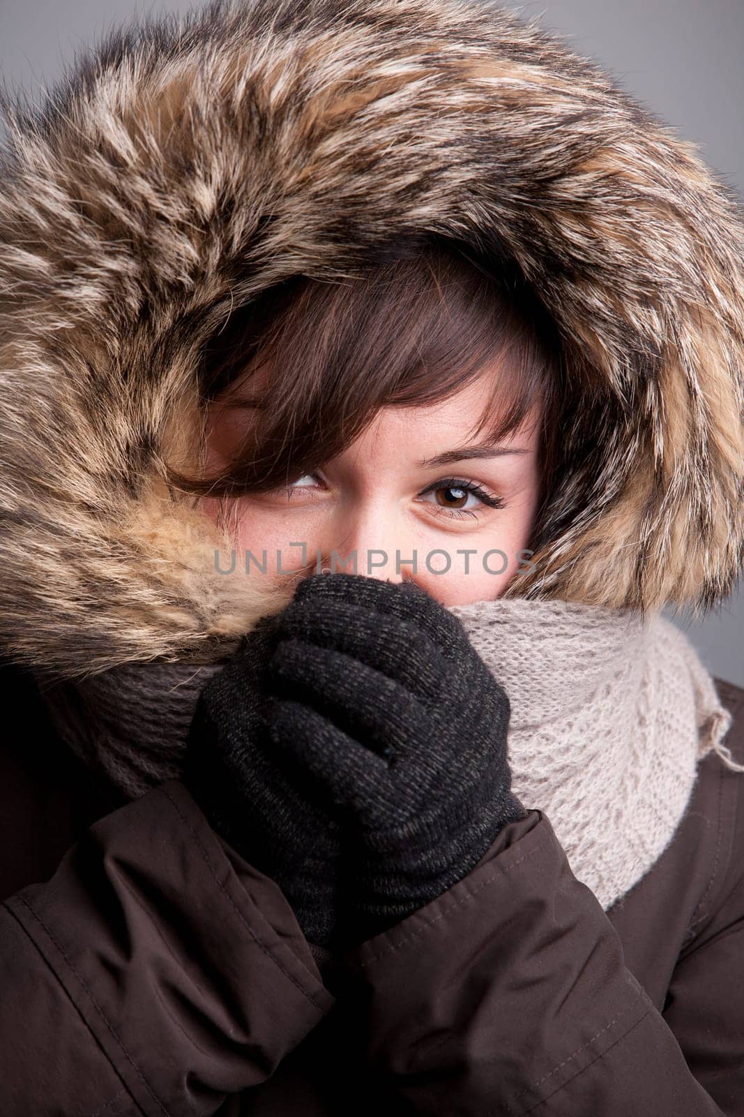A pretty natural smiling girl in winter clothes