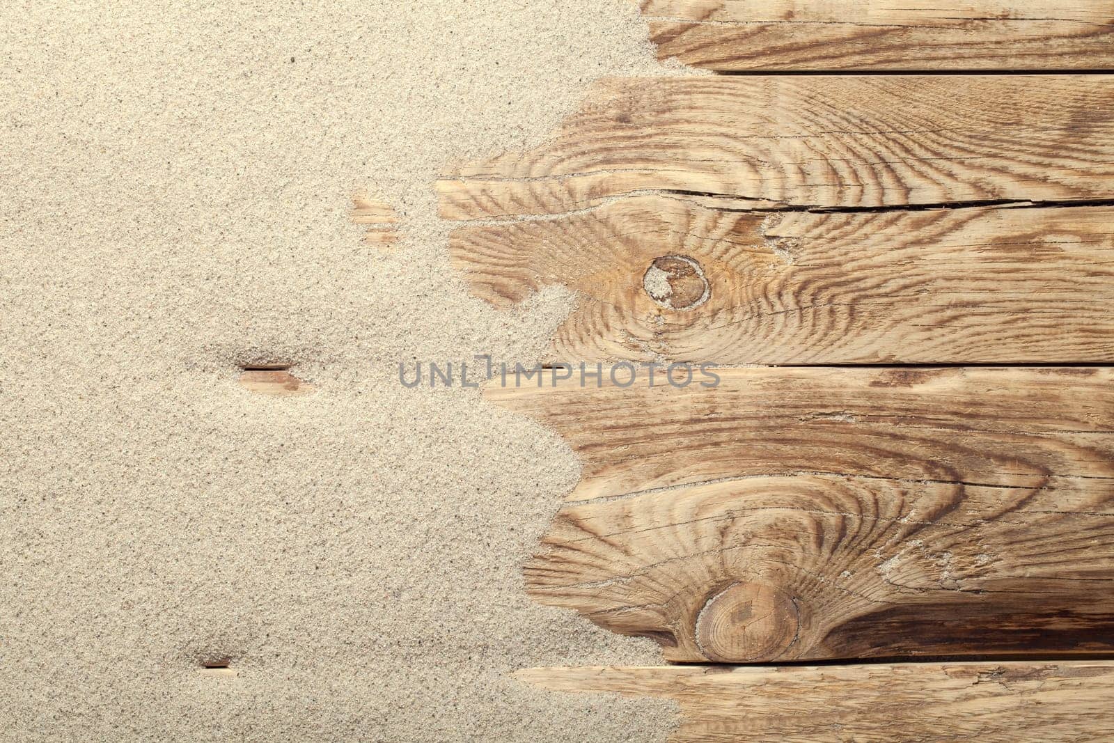 sand on planked wood. summer background with copy space. top view