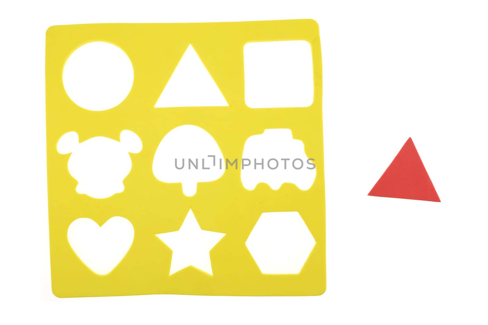 A close up shot of a childs shape finder game
