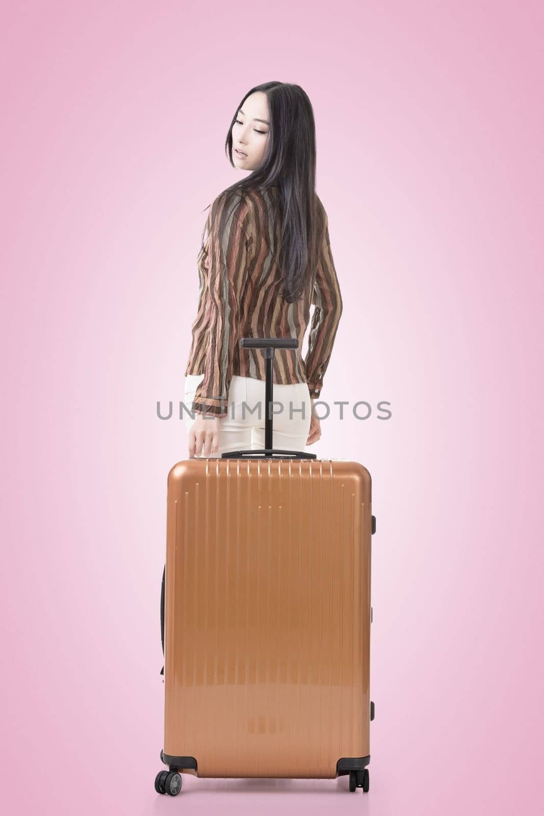 Modern Asian woman stand with a luggage.