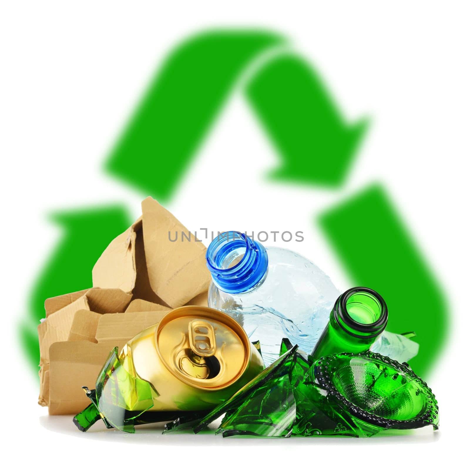 Composition with recyclable garbage consisting of glass, plastic, metal and paper isolated on white background