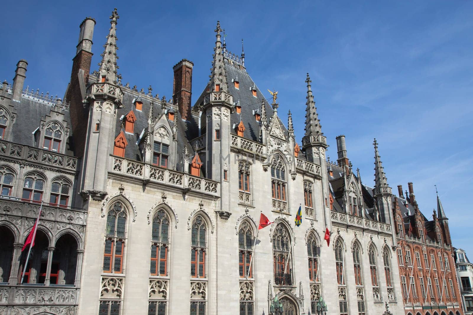 Side view of The Provinciaal Hof (Province Court) is a Neogothical building on the market place in Bruges (Belgium)