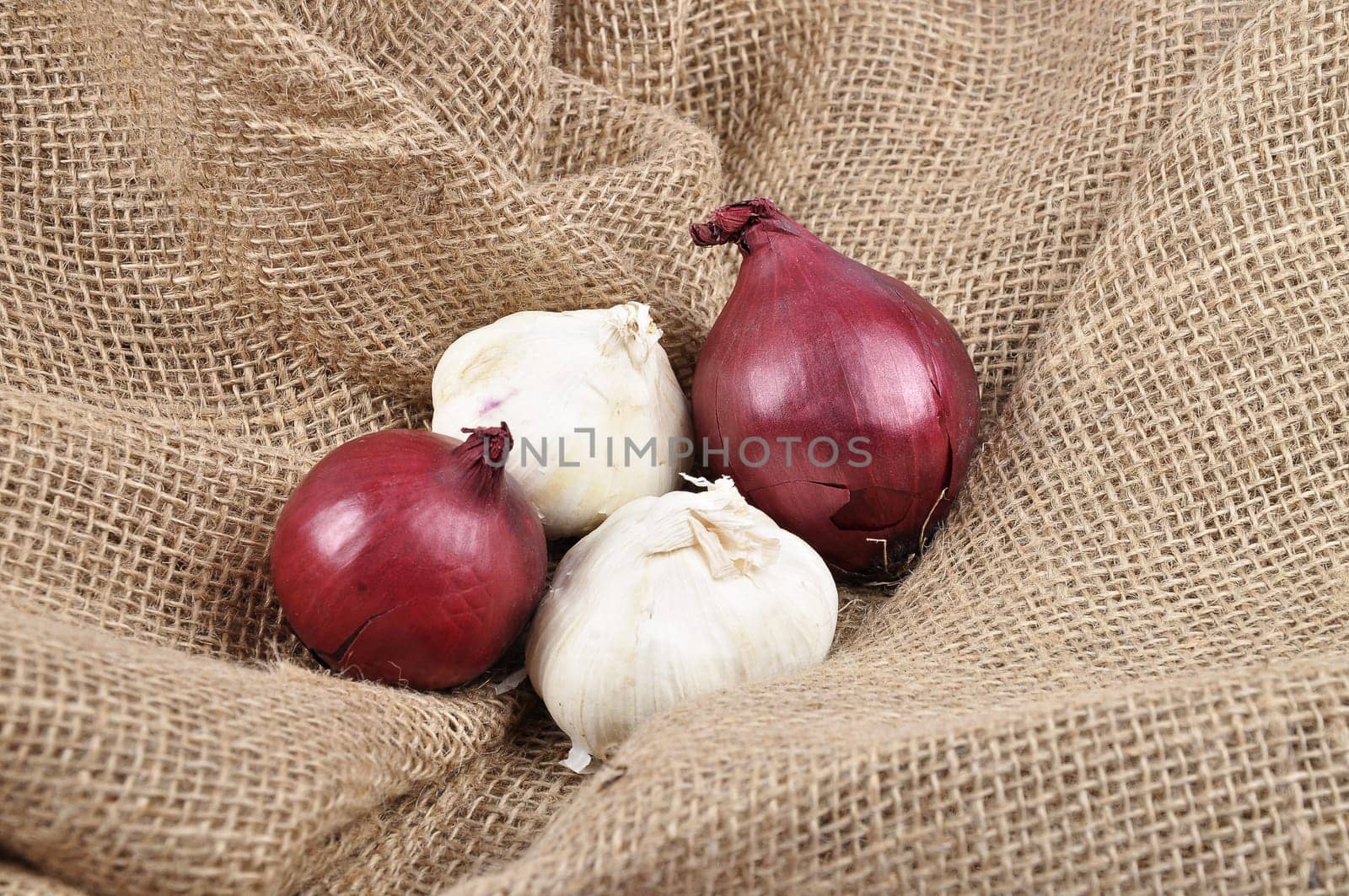 Onions and garlic on jute