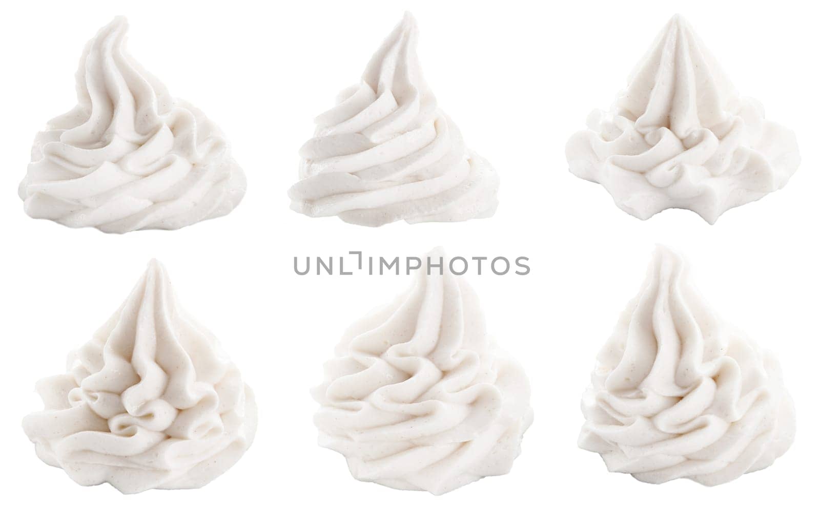 Set of decorative white swirls for dessert toppings conceptual of frozen yogurt, ice-cream or whipped cream, isolated on white