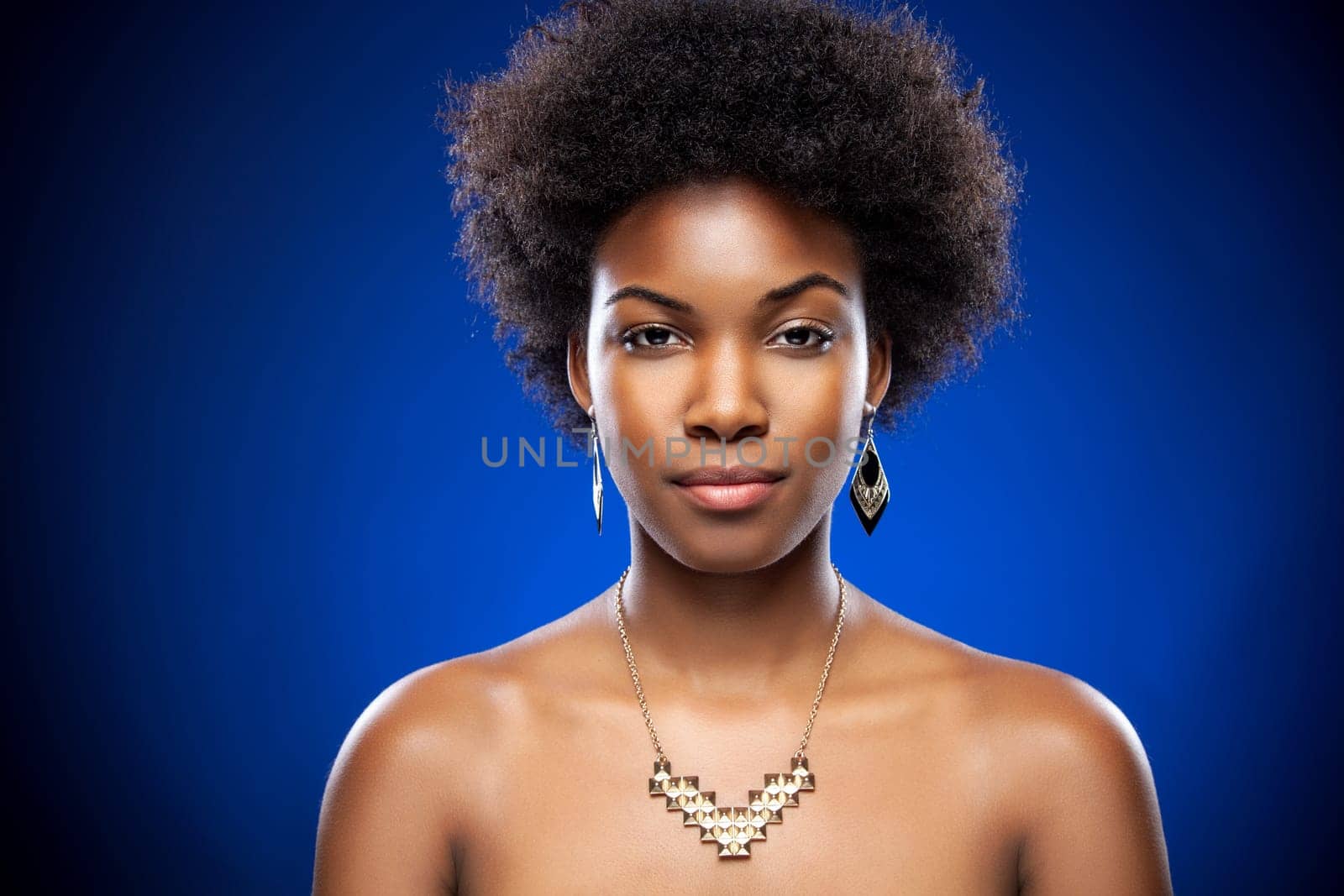 Beautiful young black woman with afro hairstyle