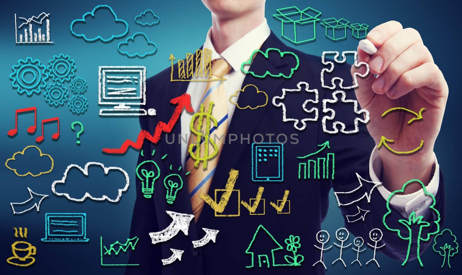 Businessman with hand written cloud computing themed texts and pictures