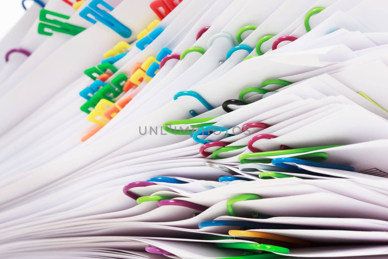 Pile of paper with colorful clips