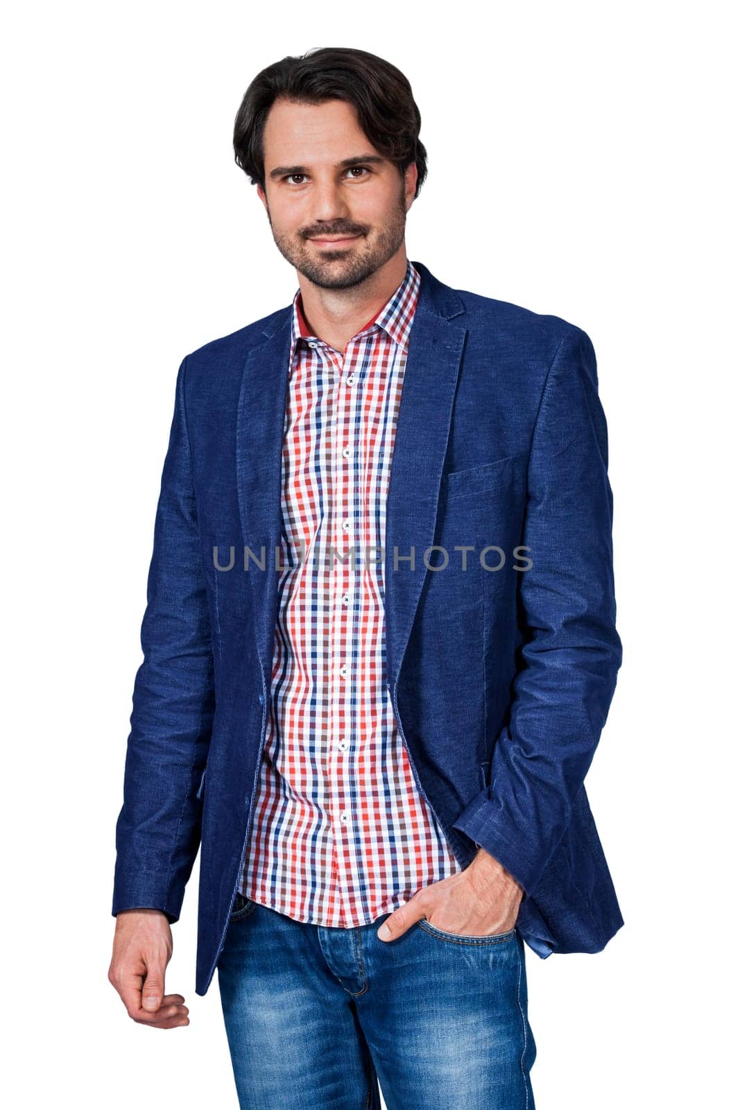 Young man in trendy casual look with dark hair and beard isolated against a white background