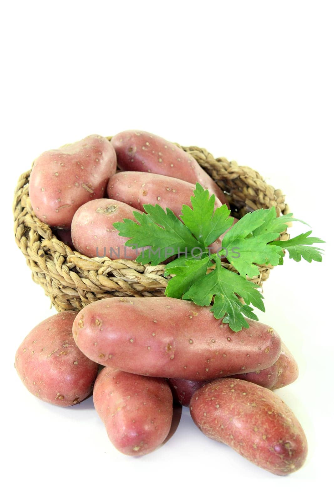 raw,red potatoes against a white background