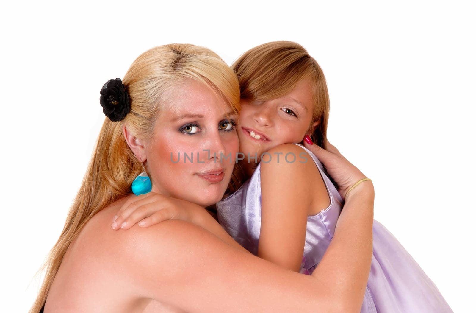 A portrait of a mother hugging her little daughter in closeup, isolated.for white background..