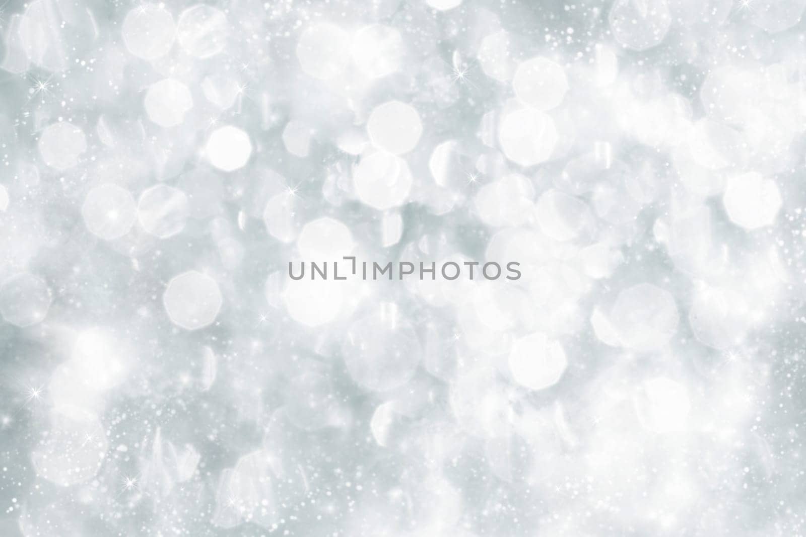 Light silver abstract Christmas background with white snowflakes