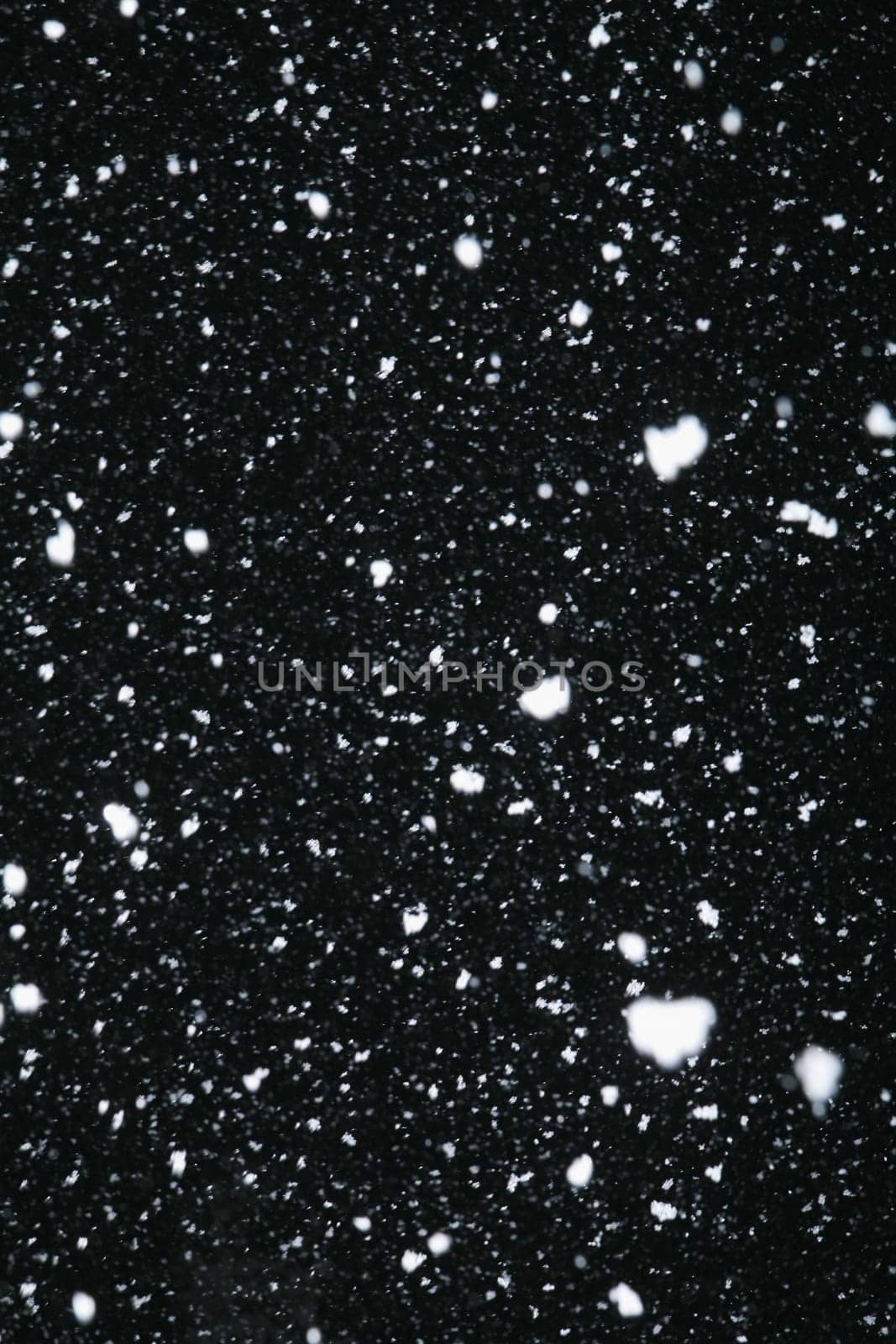 Real snowfall at night