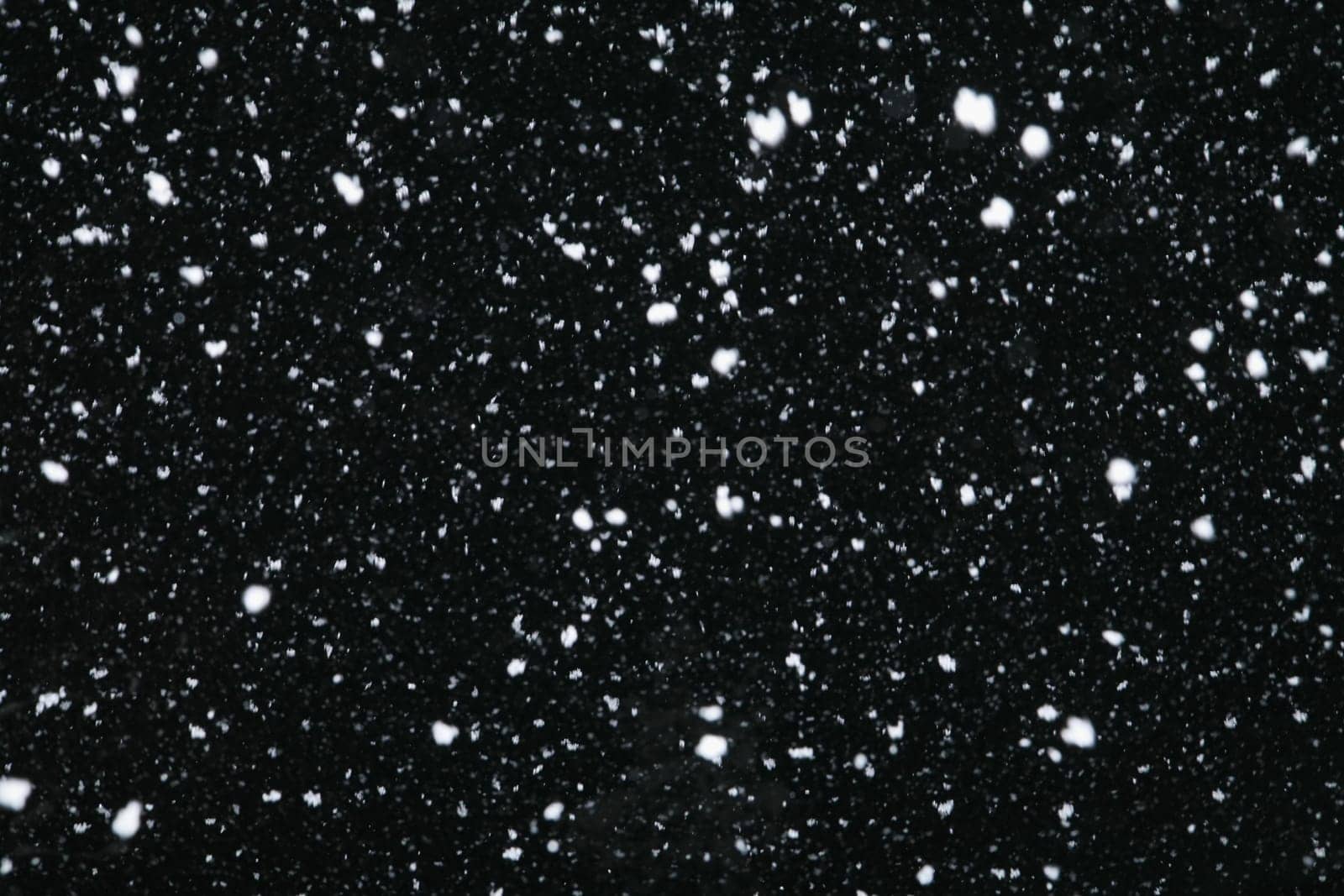 Real snowfall at night
