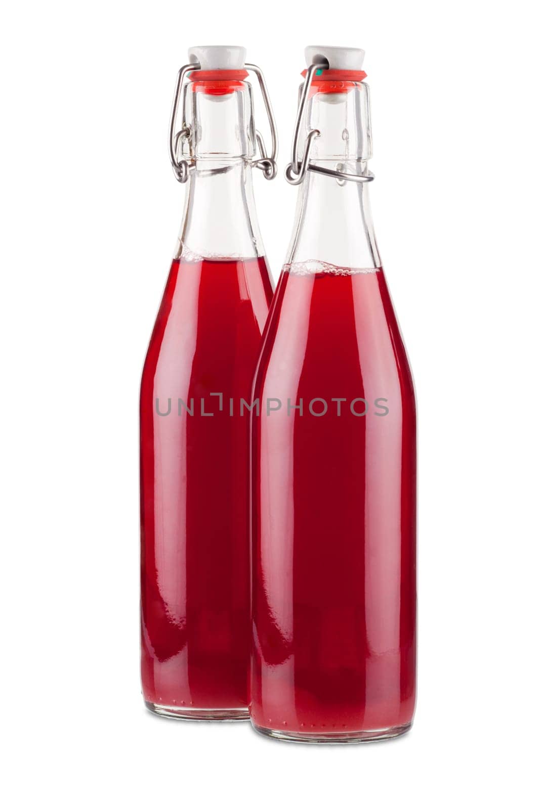 Two bottles of fresh currant syrup isolated on white background