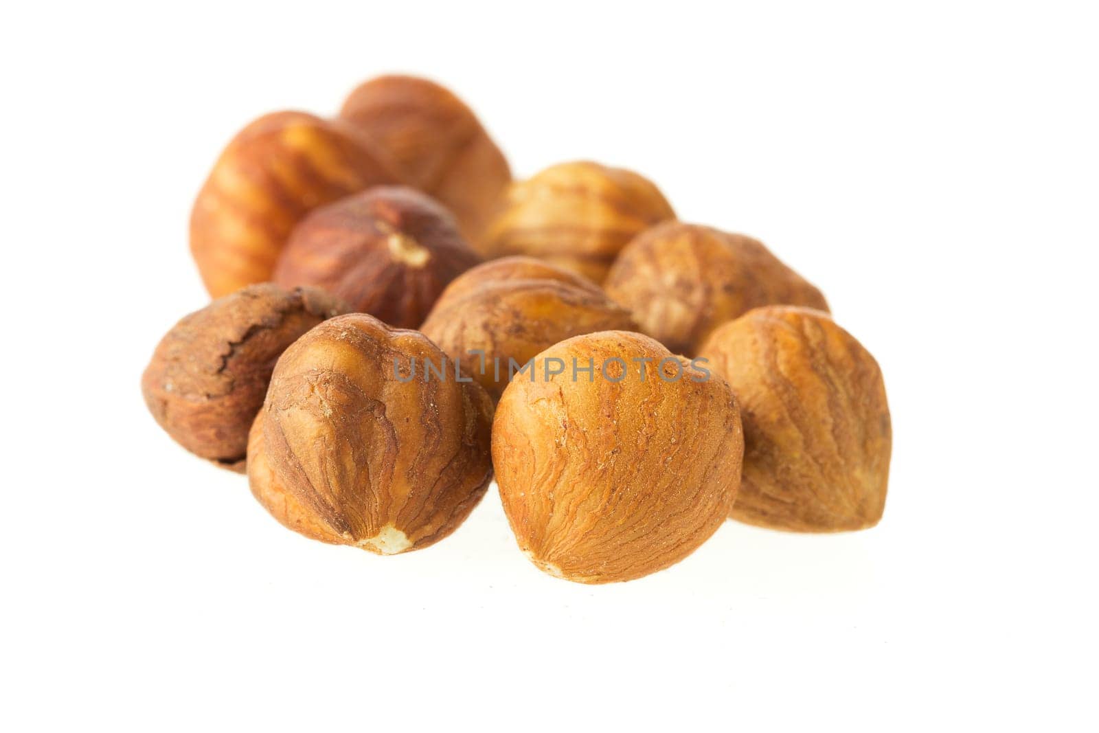 Group of hazelnuts isolated on a white background