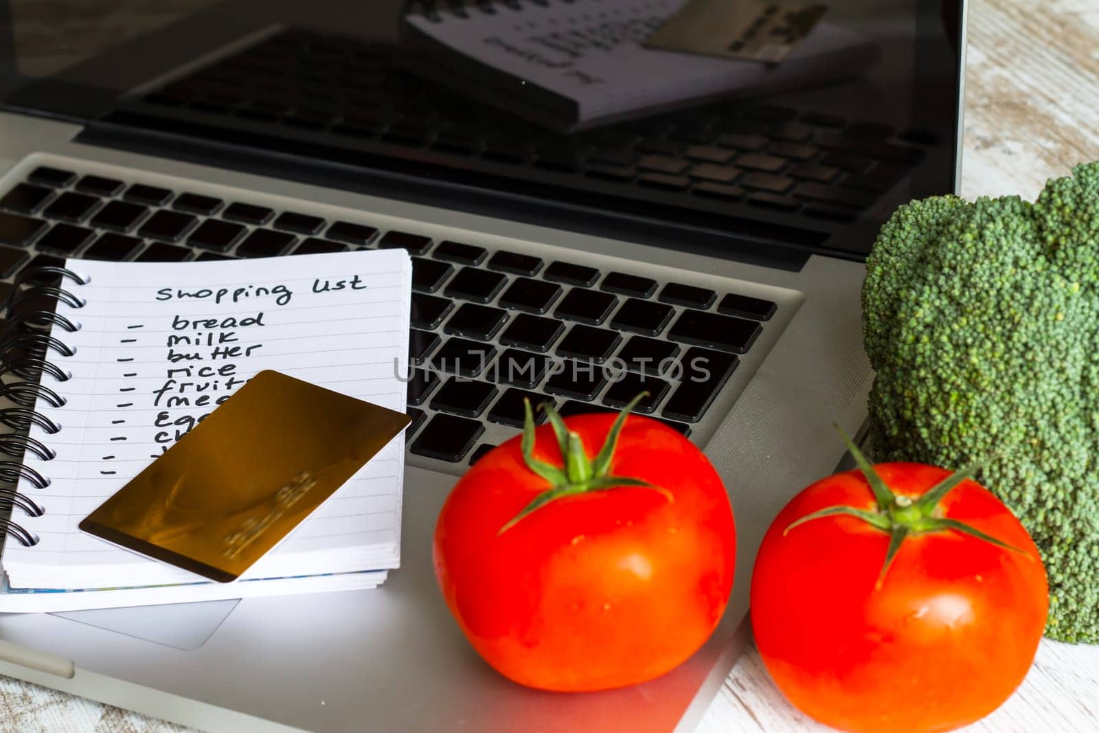 Buying groceries on line with a credit card.