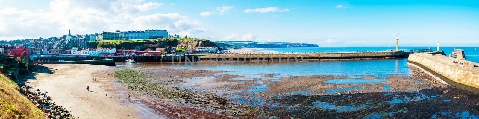 Scenic view of Whitby city in autumn sunny day.Whitby's attraction as a tourist destination is enhanced by its association with the world famous horror novel Dracula, written by Bram Stoker