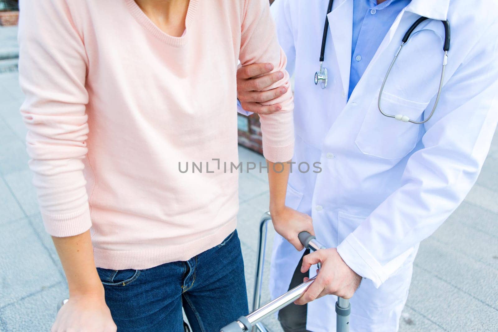 Close up view of a doctor helping patient
