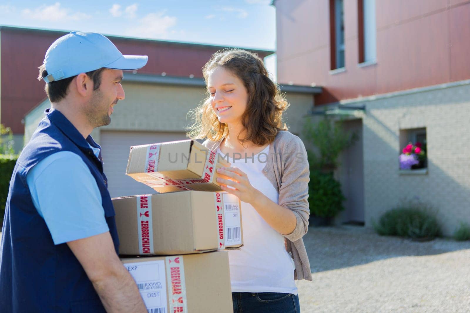 View of a Young attractive woman checking her parcel