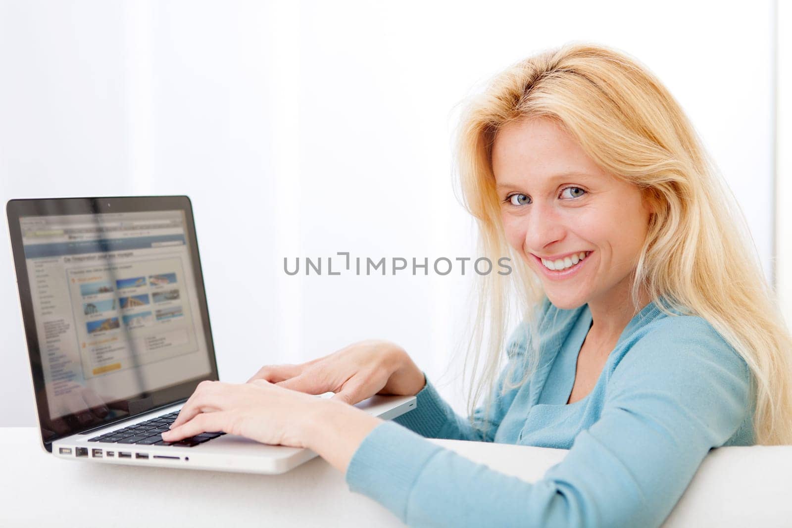 View of a Young attractive woman surfing on internet